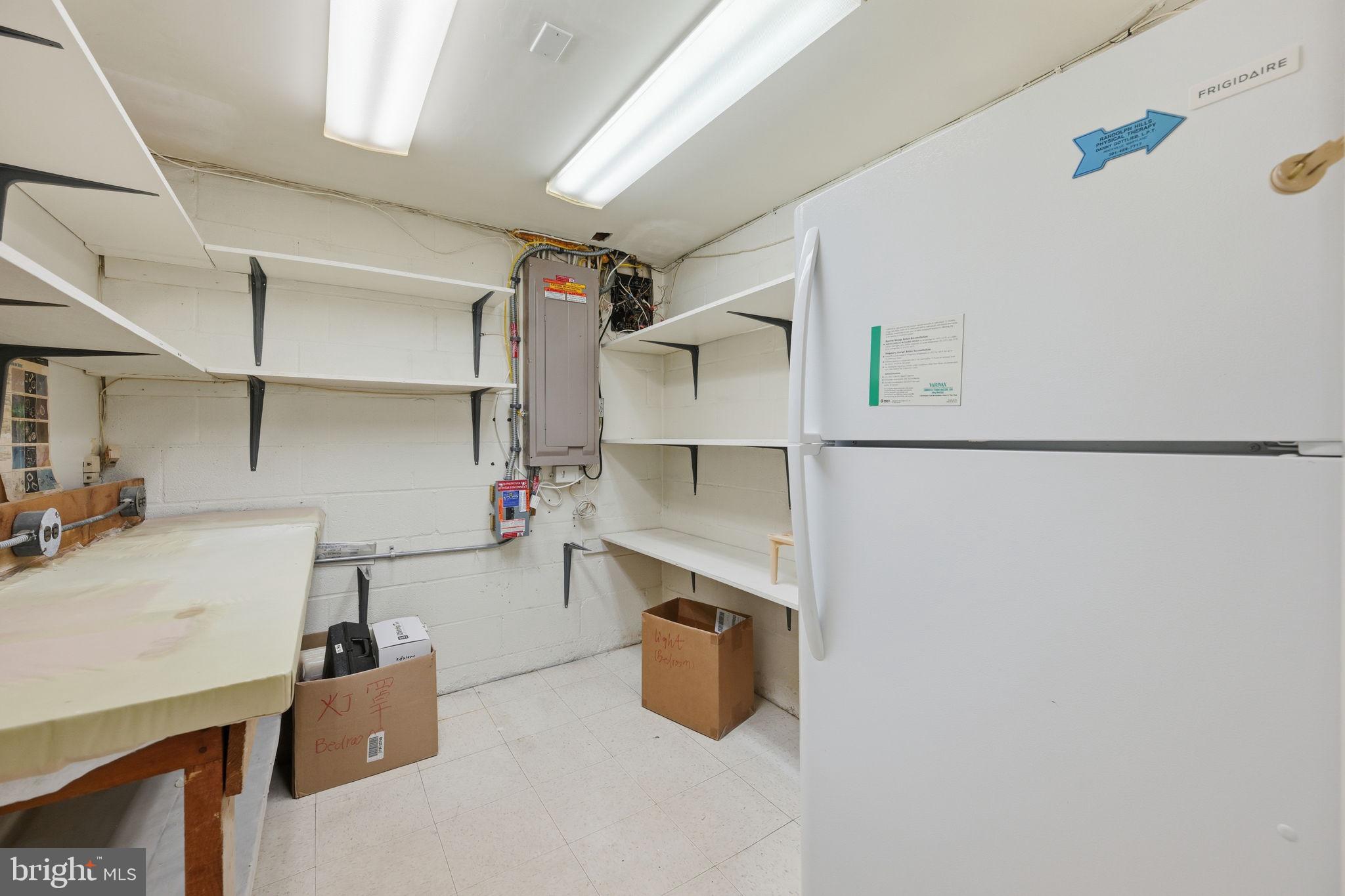 1721 University Boulevard West Silver Spring, MD 20902 - Photo 35 of 38 a kitchen with cabinets and a sink