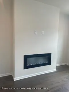 a stove top oven sitting inside of a kitchen