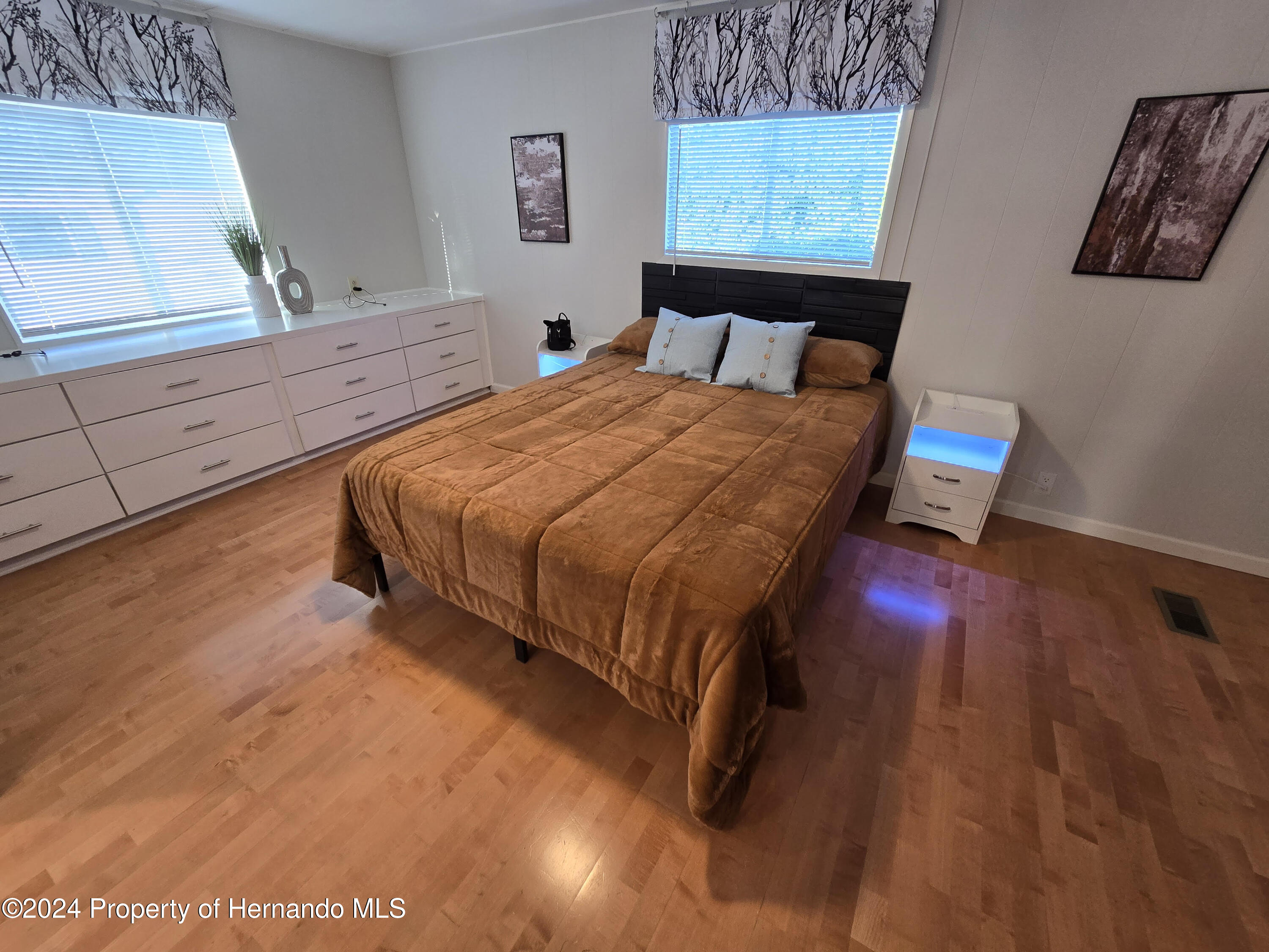 15260 Brookridge Boulevard Brooksville, FL 34613 - Photo 33 of 56 a bedroom with a bed and a window