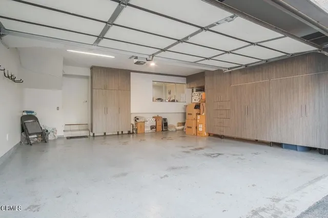 a view of a livingroom with gym equipment