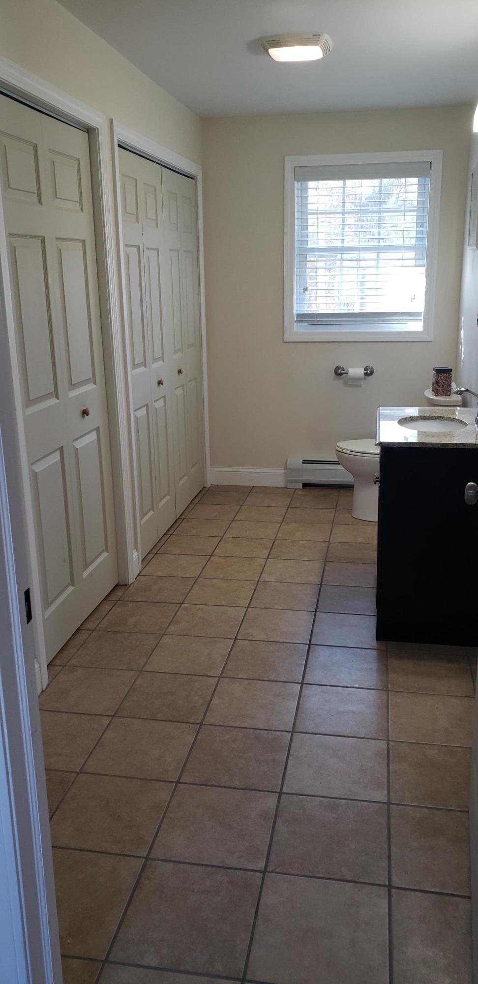204 Brewer Lake Road Orrington, ME 04474 - Photo 12 of 13 First Floor Half bath-Laundry-storage
