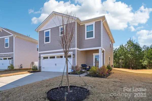 a front view of a house with entertaining space