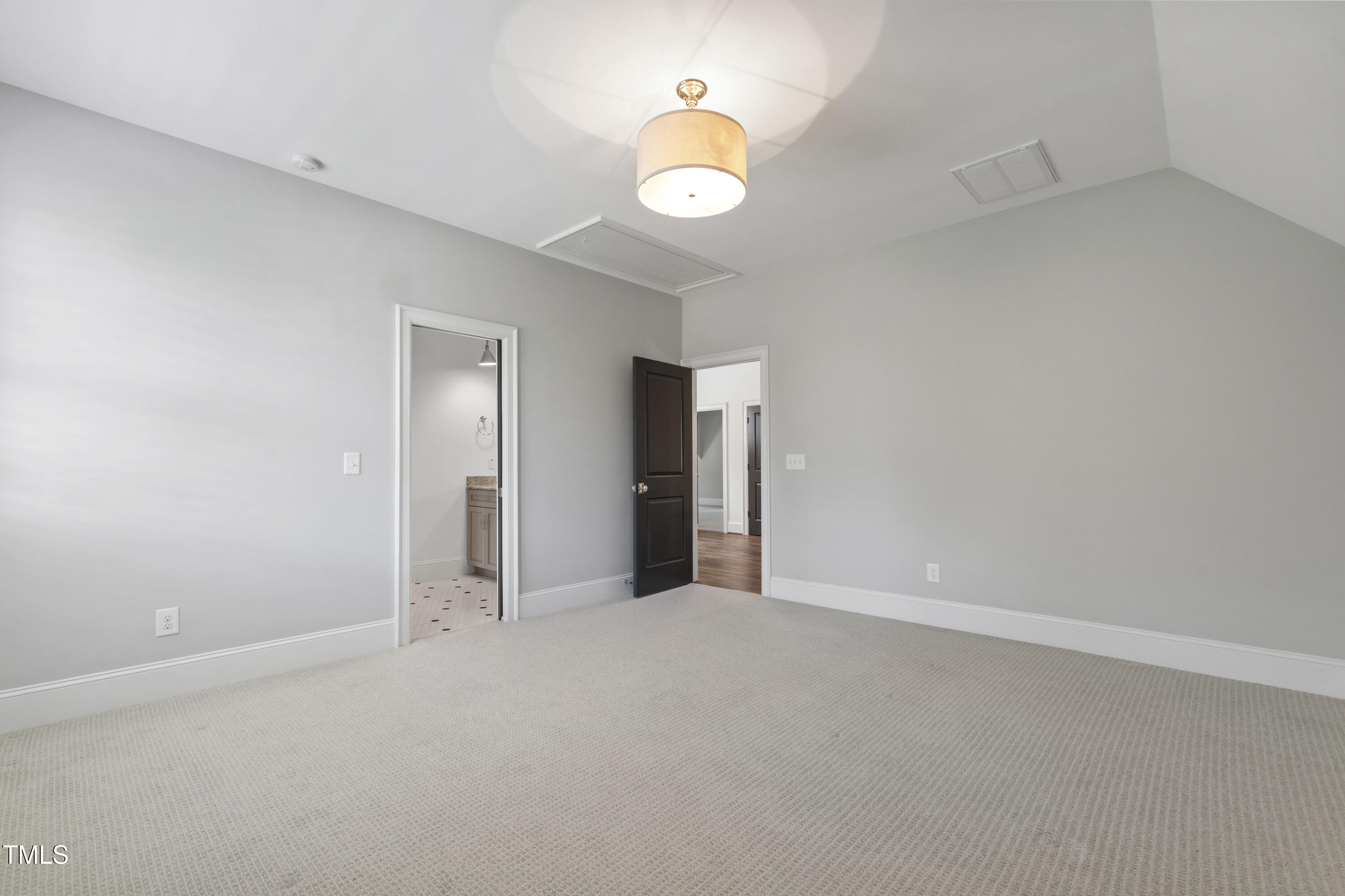 523 Vick Avenue Raleigh, NC 27612 - Photo 45 of 77 a view of an empty room with a window