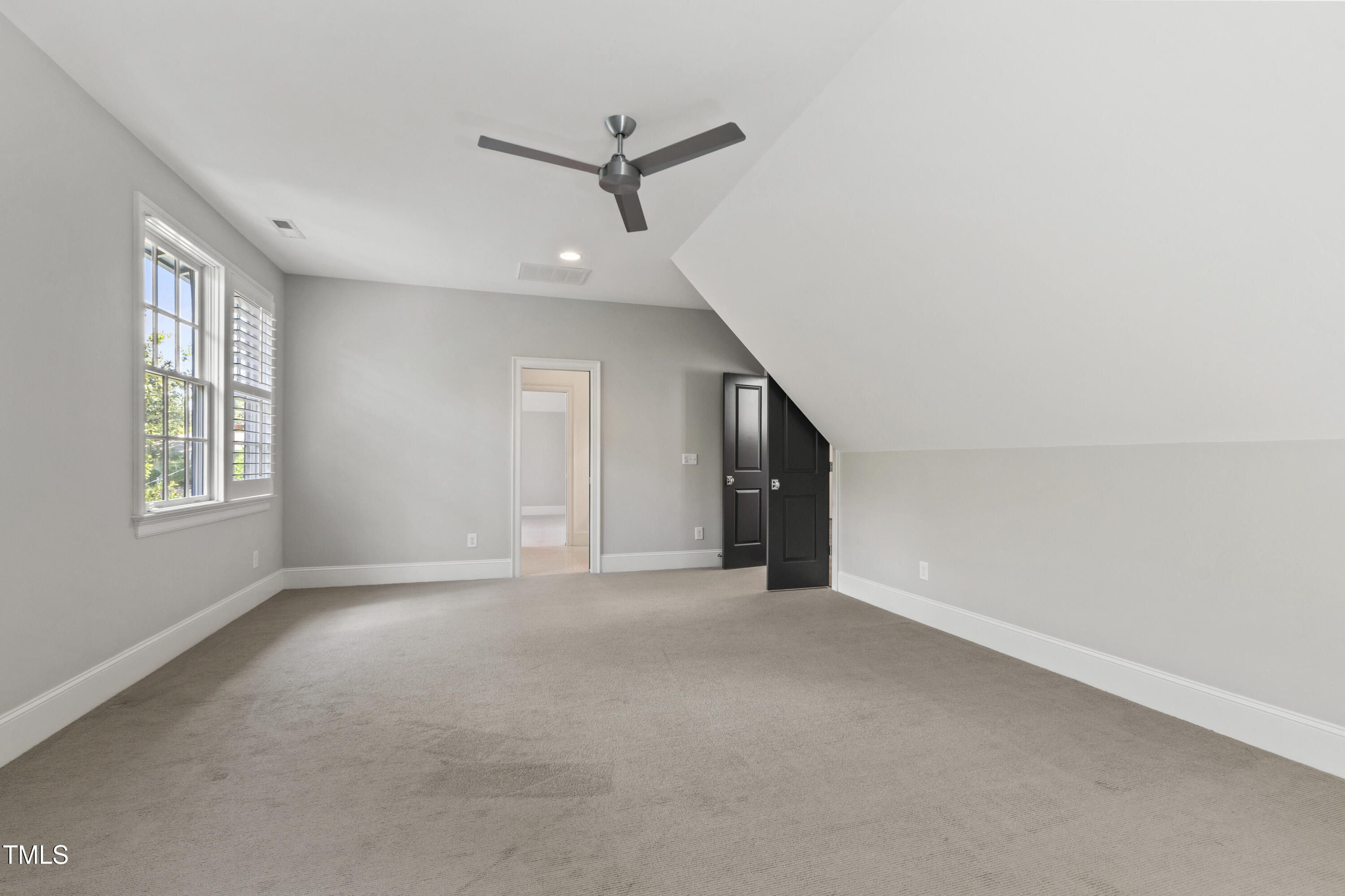 523 Vick Avenue Raleigh, NC 27612 - Photo 53 of 77 a view of an empty room with a window