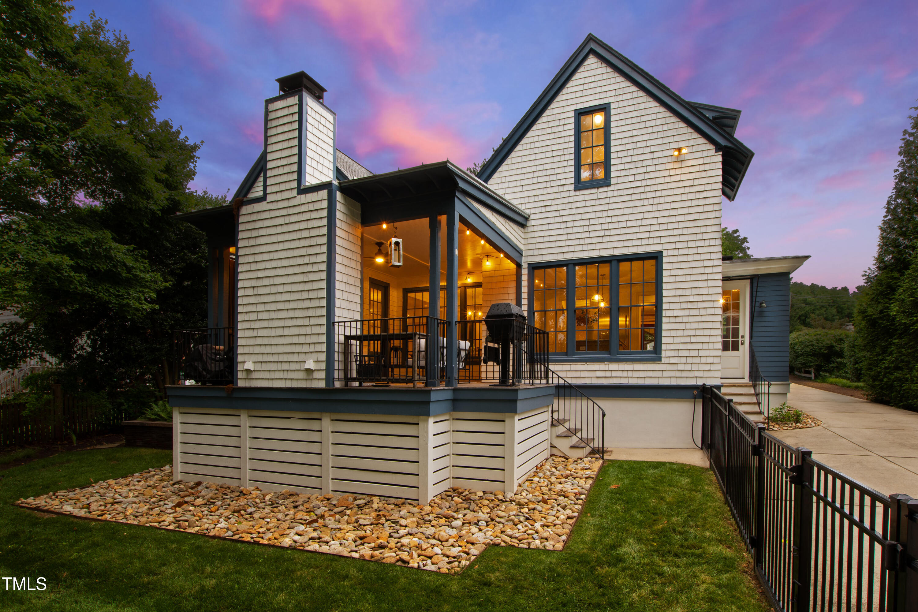 523 Vick Avenue Raleigh, NC 27612 - Photo 75 of 77 a front view of a house with a yard