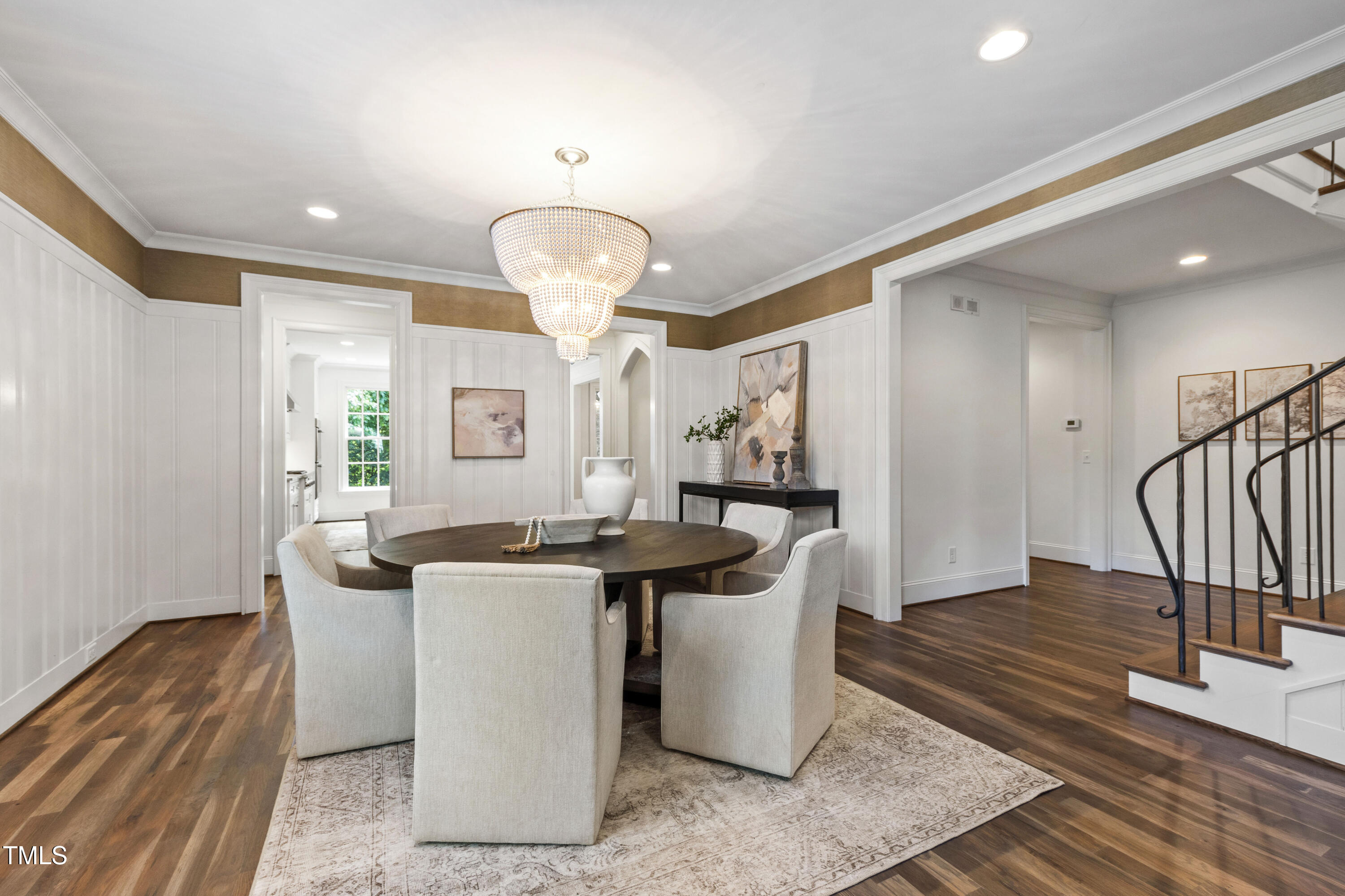 523 Vick Avenue Raleigh, NC 27612 - Photo 6 of 77 a kitchen with stainless steel appliances granite countertop a sink a stove and a wooden floors