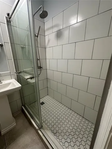 a bathroom with a sink and toilet
