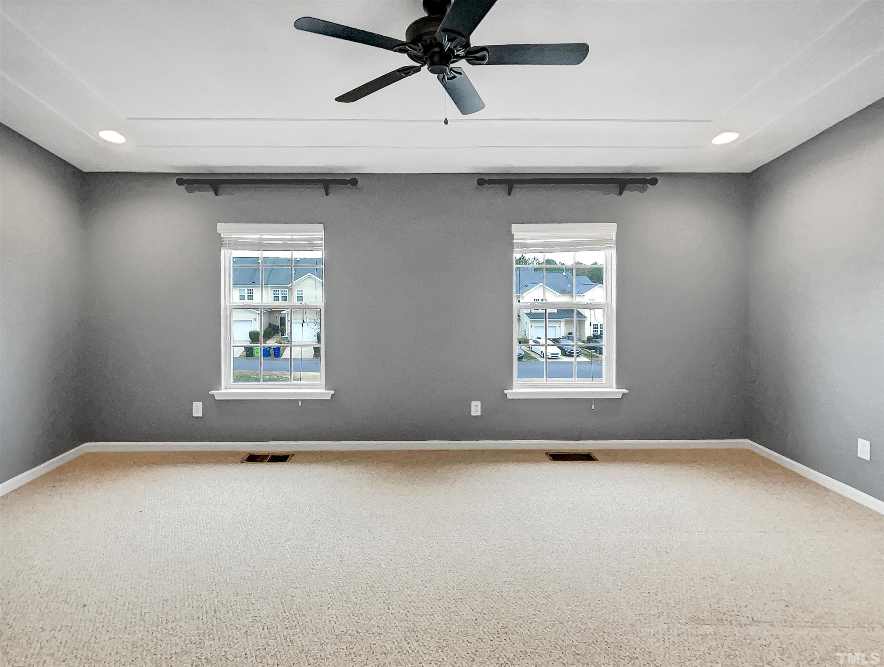 1111 Consortium Drive, Unit 101 Raleigh, NC 27603 - Photo 8 of 17 a view of an empty room with a window