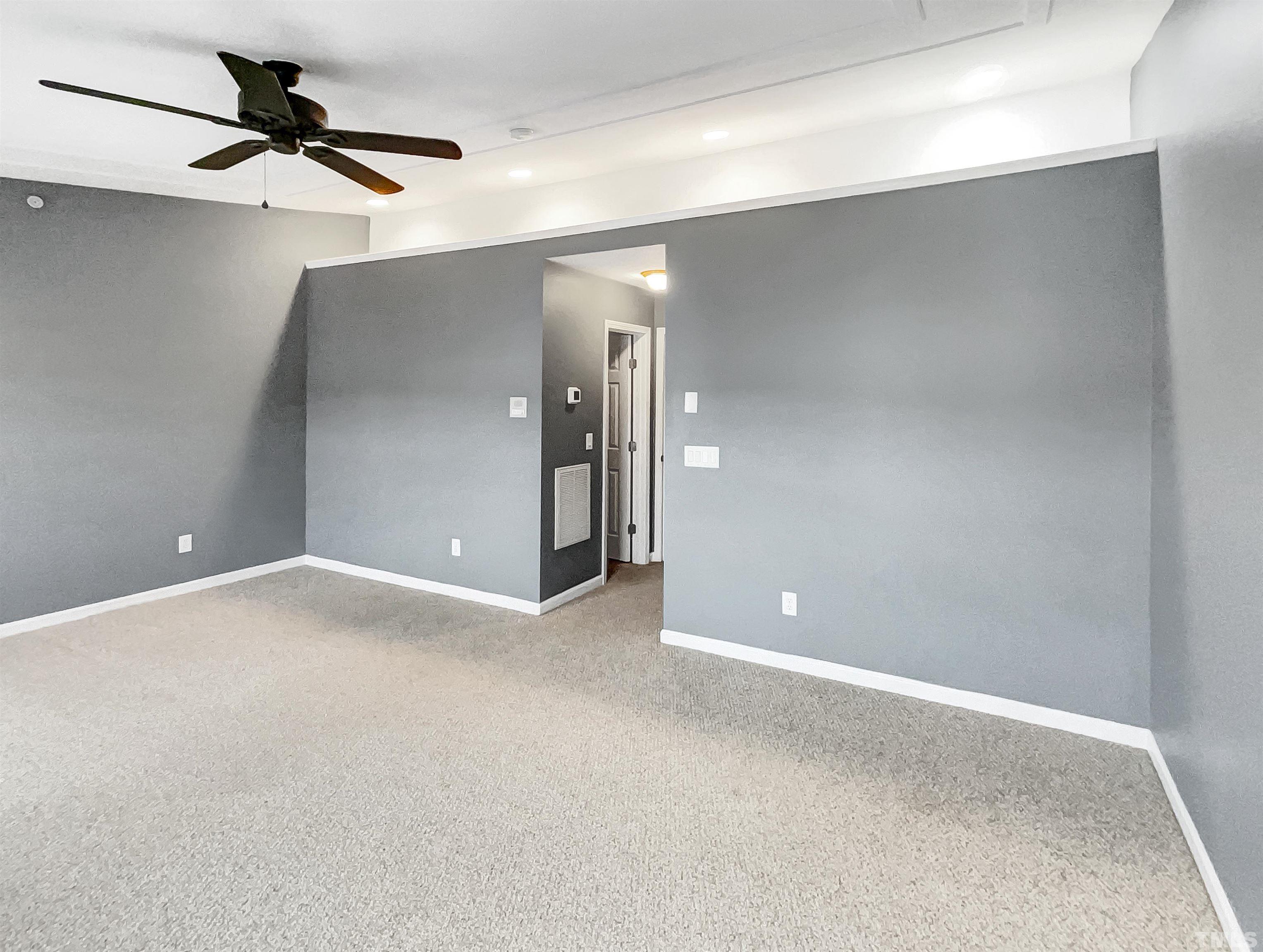 1111 Consortium Drive, Unit 101 Raleigh, NC 27603 - Photo 9 of 17 a view of an empty room