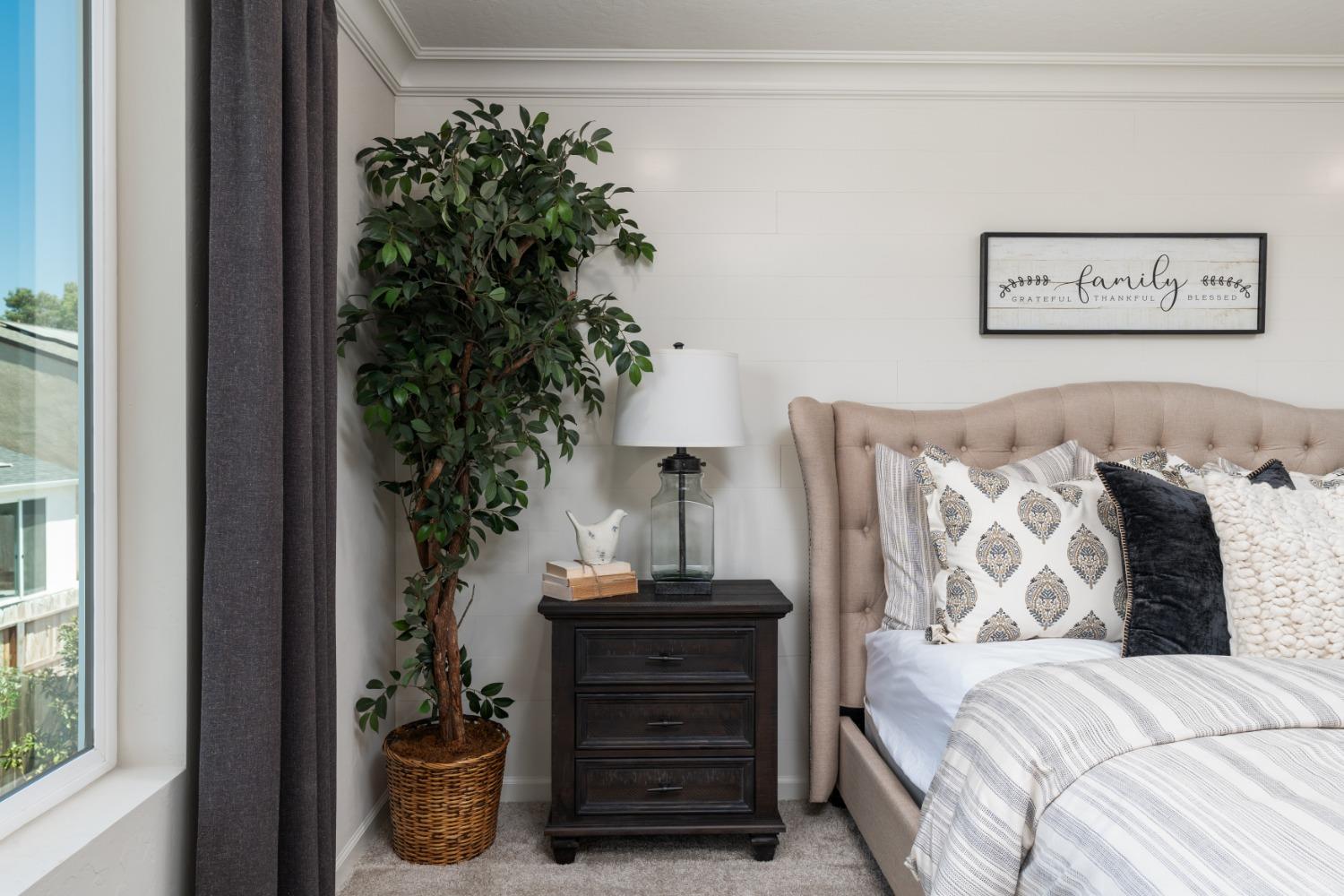 1198 Significant Way West Madera, CA 93636 - Photo 18 of 29 a bedroom with a bed and a window