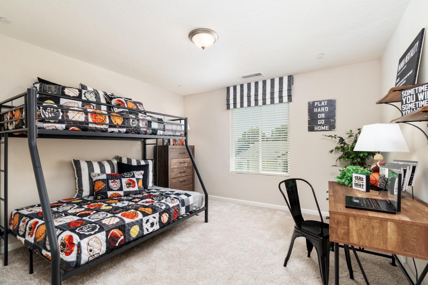 1198 Significant Way West Madera, CA 93636 - Photo 27 of 29 a bedroom with furniture and a window