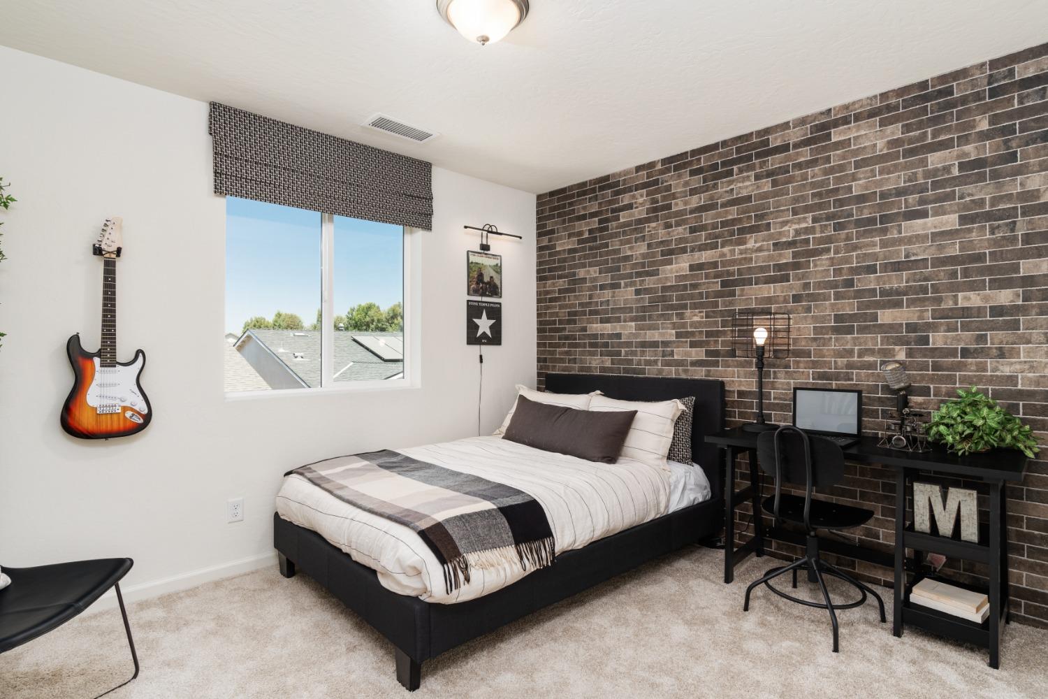 1198 Significant Way West Madera, CA 93636 - Photo 29 of 29 a bedroom with a bed and a table