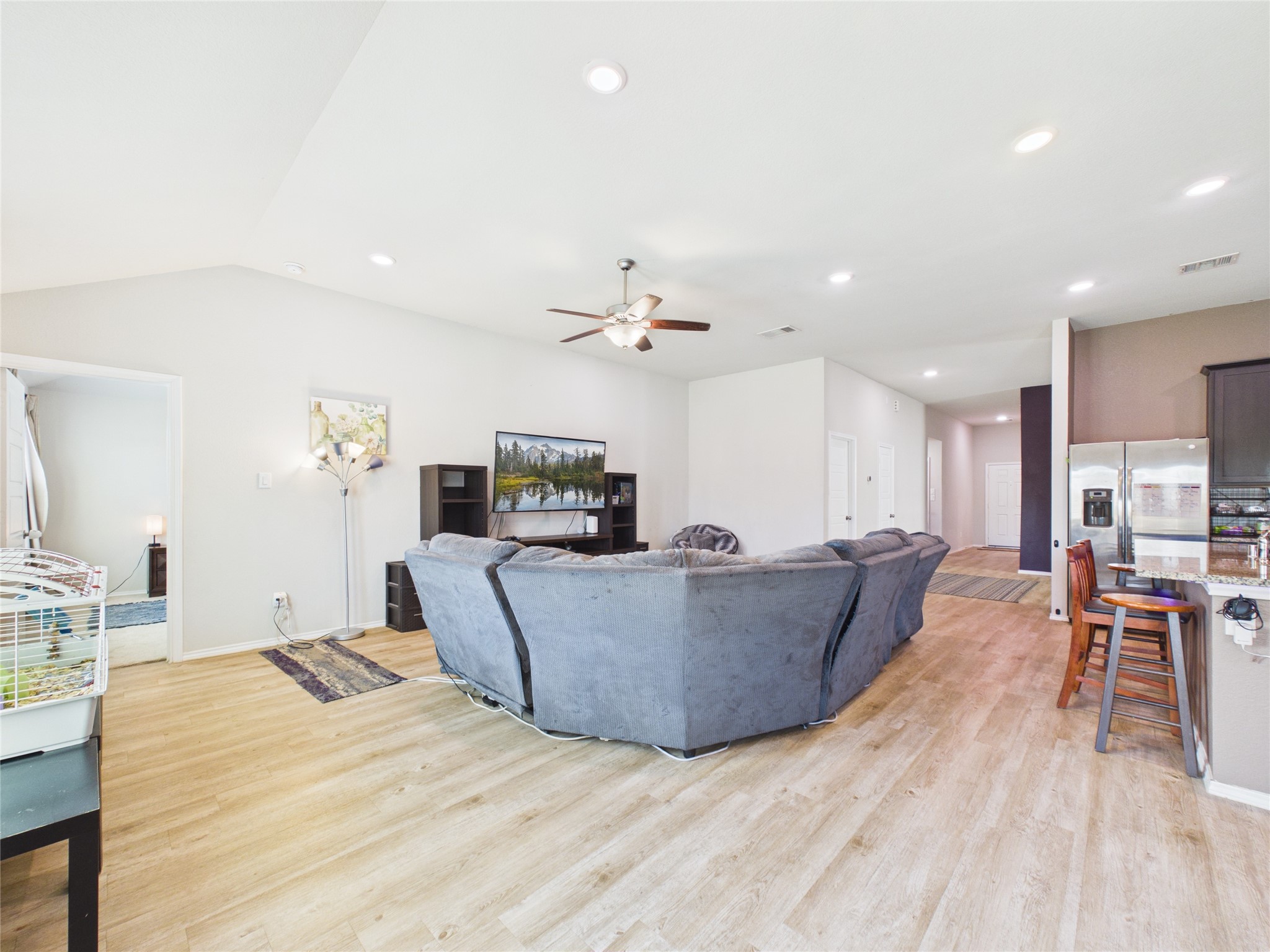 1237 Steed Bluff Drive Alvin, TX 77511 - Photo 13 of 50 a living room with furniture and a flat screen tv