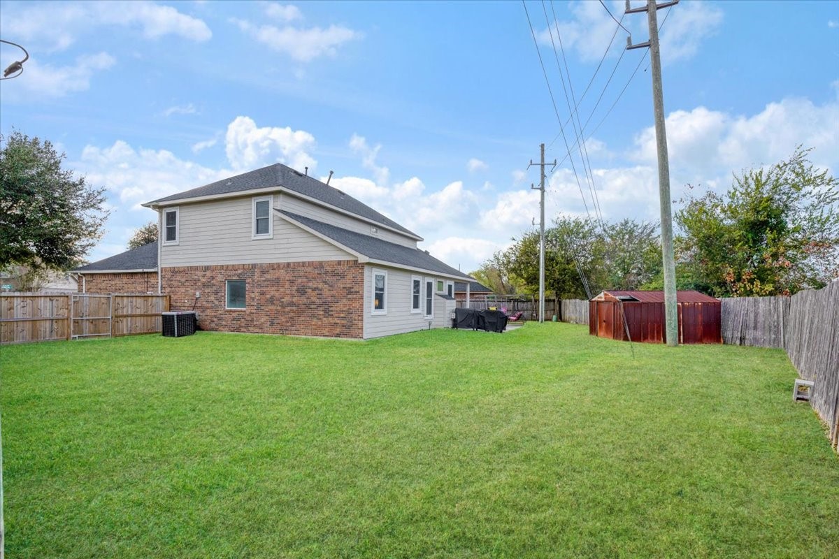 1202 Collier Point Lane Fresno, TX 77545 - Photo 25 of 29 Plenty of space to play, entertain, and make memories—this backyard is ready for it all.