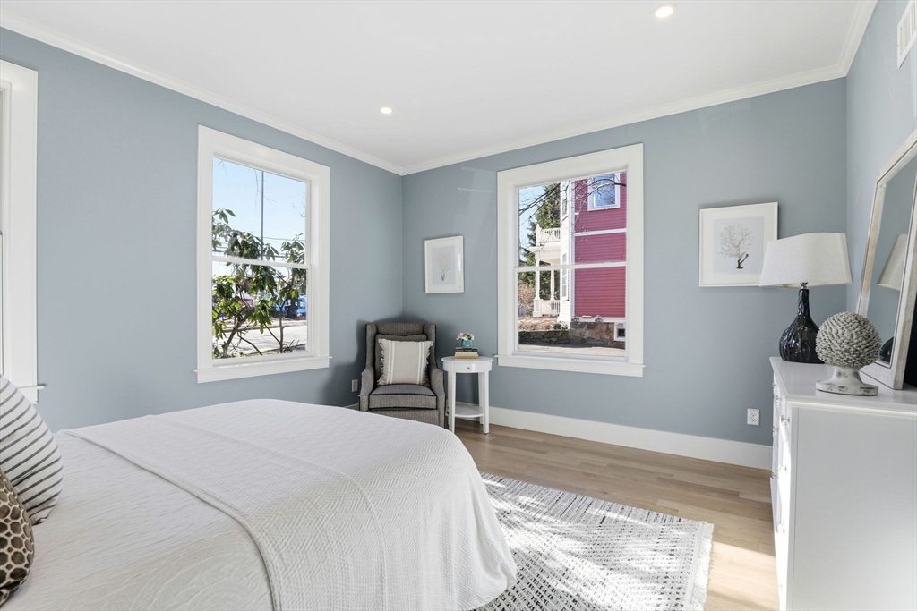 90 Addington Road, Unit 1 Brookline, MA 02445 - Photo 13 of 24 a bedroom with a bed and a window