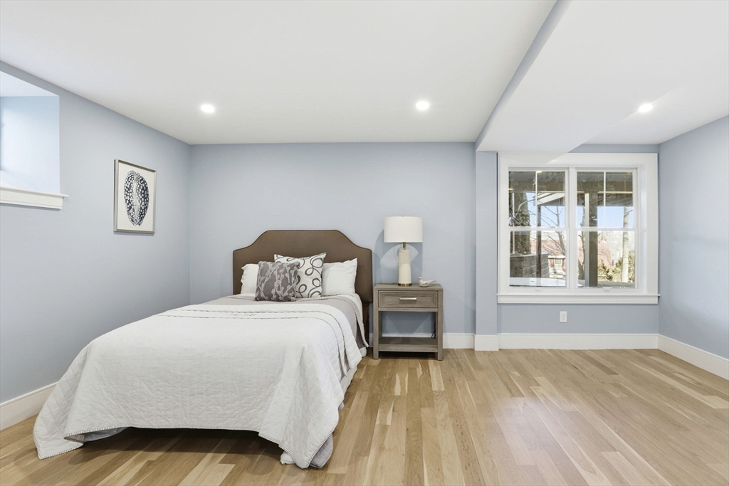 90 Addington Road, Unit 1 Brookline, MA 02445 - Photo 18 of 24 a bedroom with a bed and a window