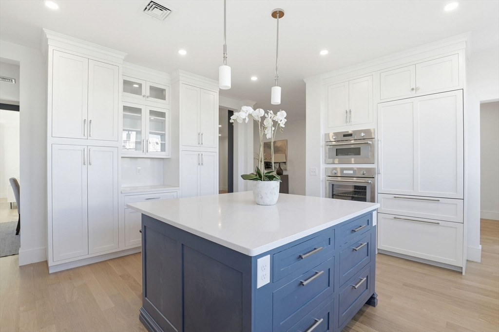 90 Addington Road, Unit 1 Brookline, MA 02445 - Photo 6 of 24 a kitchen with a refrigerator a sink and dishwasher