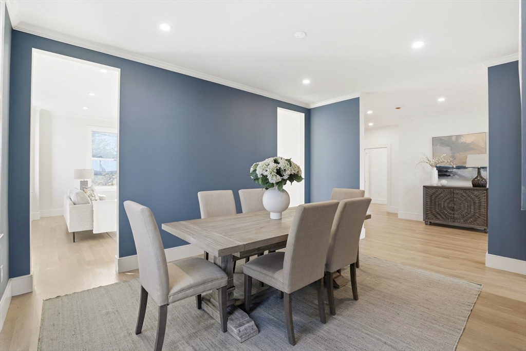90 Addington Road, Unit 1 Brookline, MA 02445 - Photo 10 of 24 a view of a dining room with furniture and wooden floor