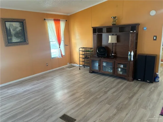 a view of living room with furniture and window