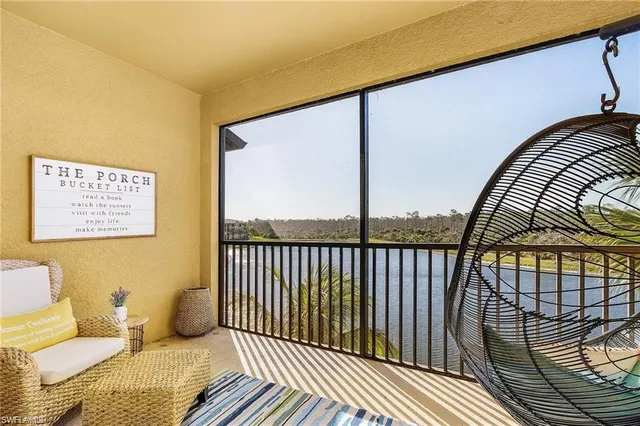 a balcony with wooden floor