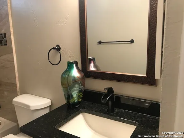 a view of a yard with a sink