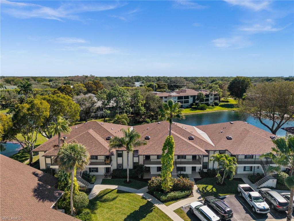 500 Misty Pines Circle, Unit 2103 Naples, FL 34105 - Photo 28 of 38 an aerial view of residential houses and city street