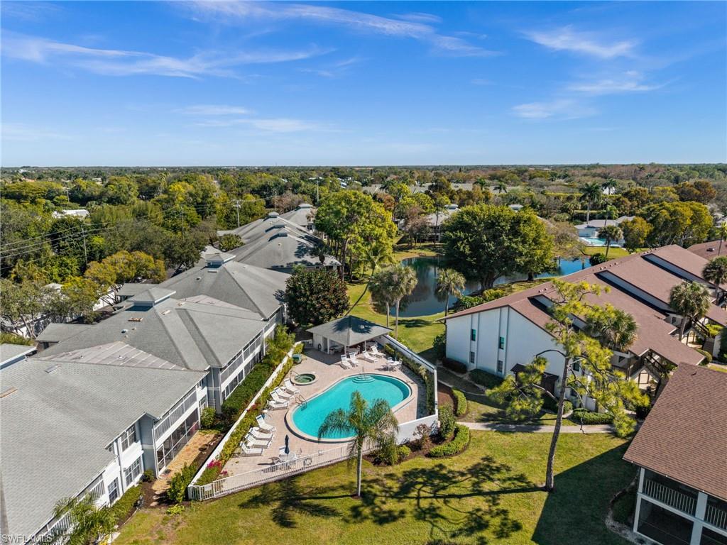 500 Misty Pines Circle, Unit 2103 Naples, FL 34105 - Photo 34 of 38 an aerial view of residential house and outdoor space