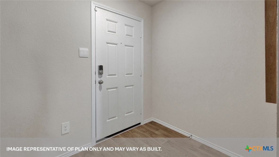 401 Wild Goose Drive Luling, TX 78648 - Photo 3 of 34 a view of a hallway