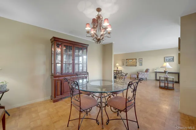 a kitchen with granite countertop a sink stove and cabinets