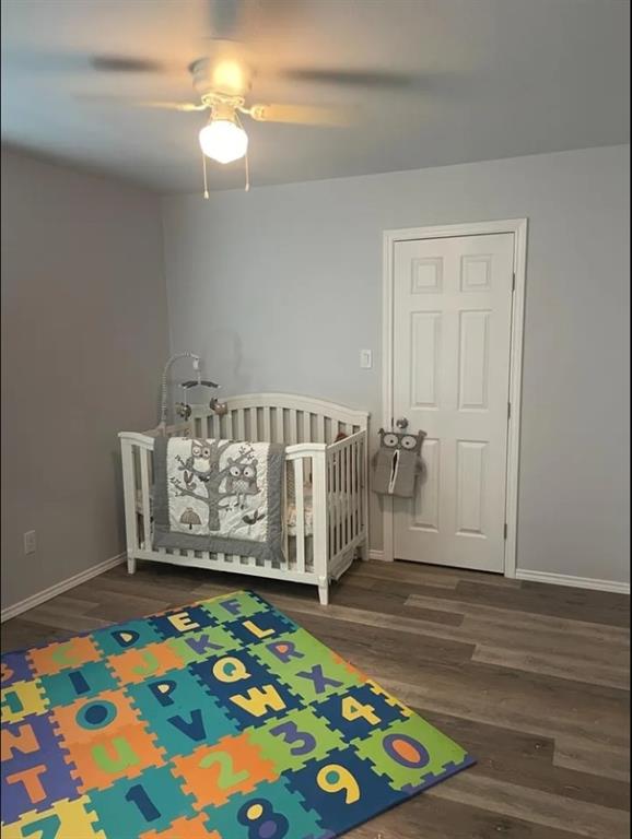 8424 10th Place Lubbock, TX 79416 - Photo 11 of 14 a view of entryway with wooden floor