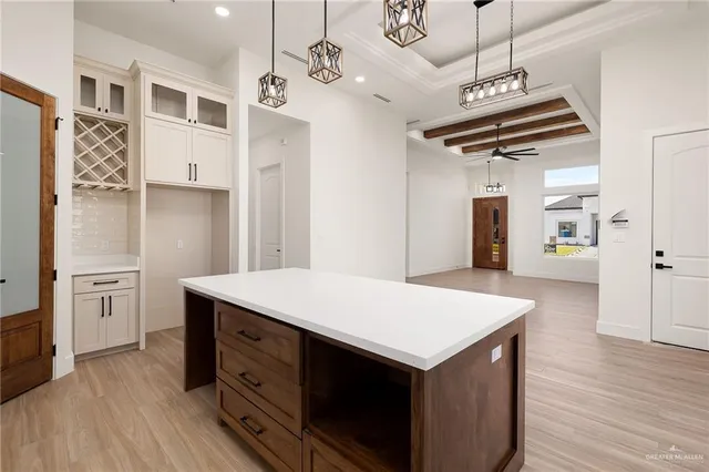 a kitchen with a refrigerator a sink and dishwasher