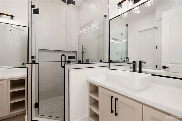 a bathroom with a sink and a mirror