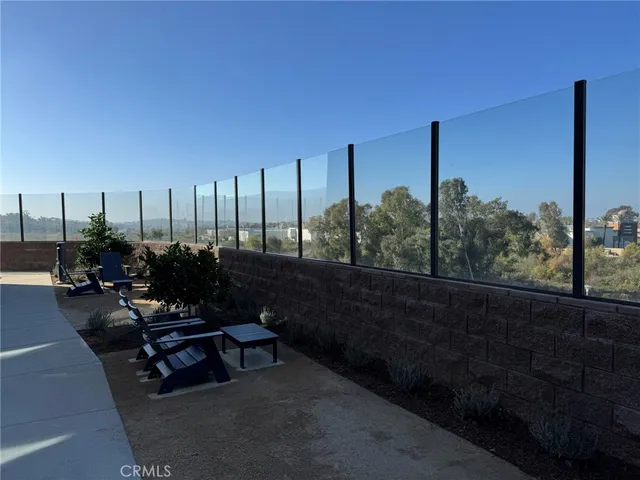 a view of a terrace with chairs