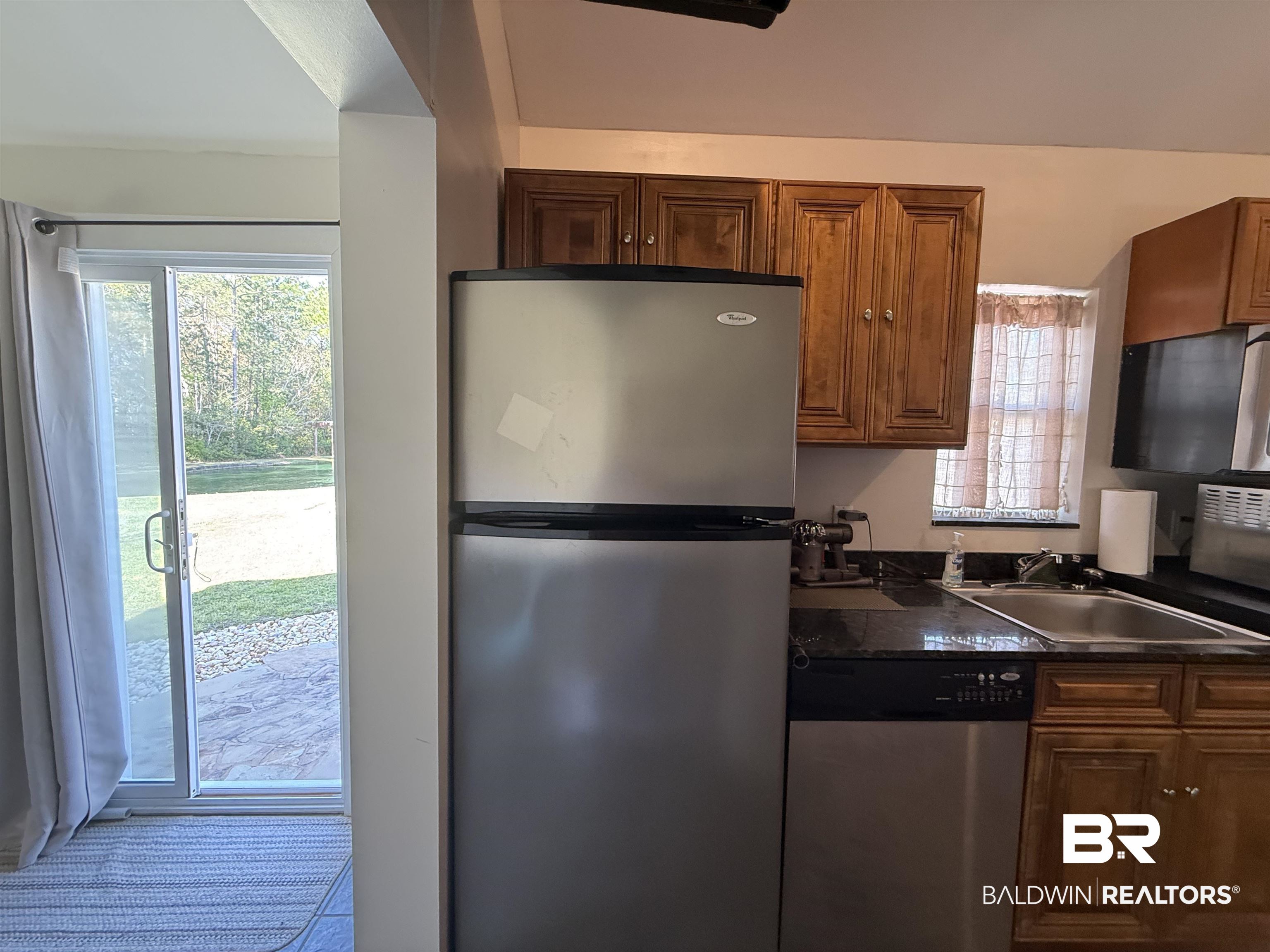28114 Preserve Trail, Unit 190 Elberta, AL 36530 - Photo 28 of 69 Kitchen with stainless steel appliances and wood finish cabinetry