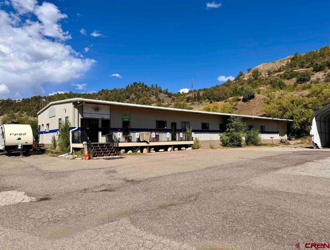 1479 Highway 3 Durango, CO 81301 - Photo 1 of 19 a view of a street with a car park in front of it