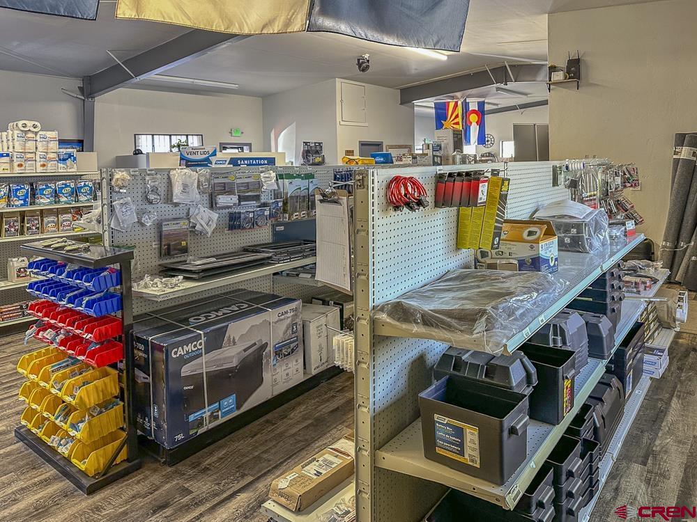 1479 Highway 3 Durango, CO 81301 - Photo 12 of 19 a utility room with stainless steel appliances and living room view