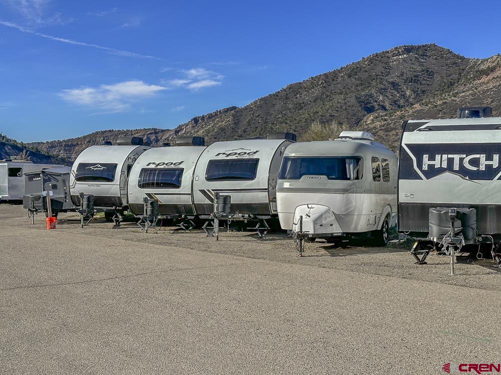 1479 Highway 3 Durango, CO 81301 - Photo 18 of 19 a view of a cars park in front of house