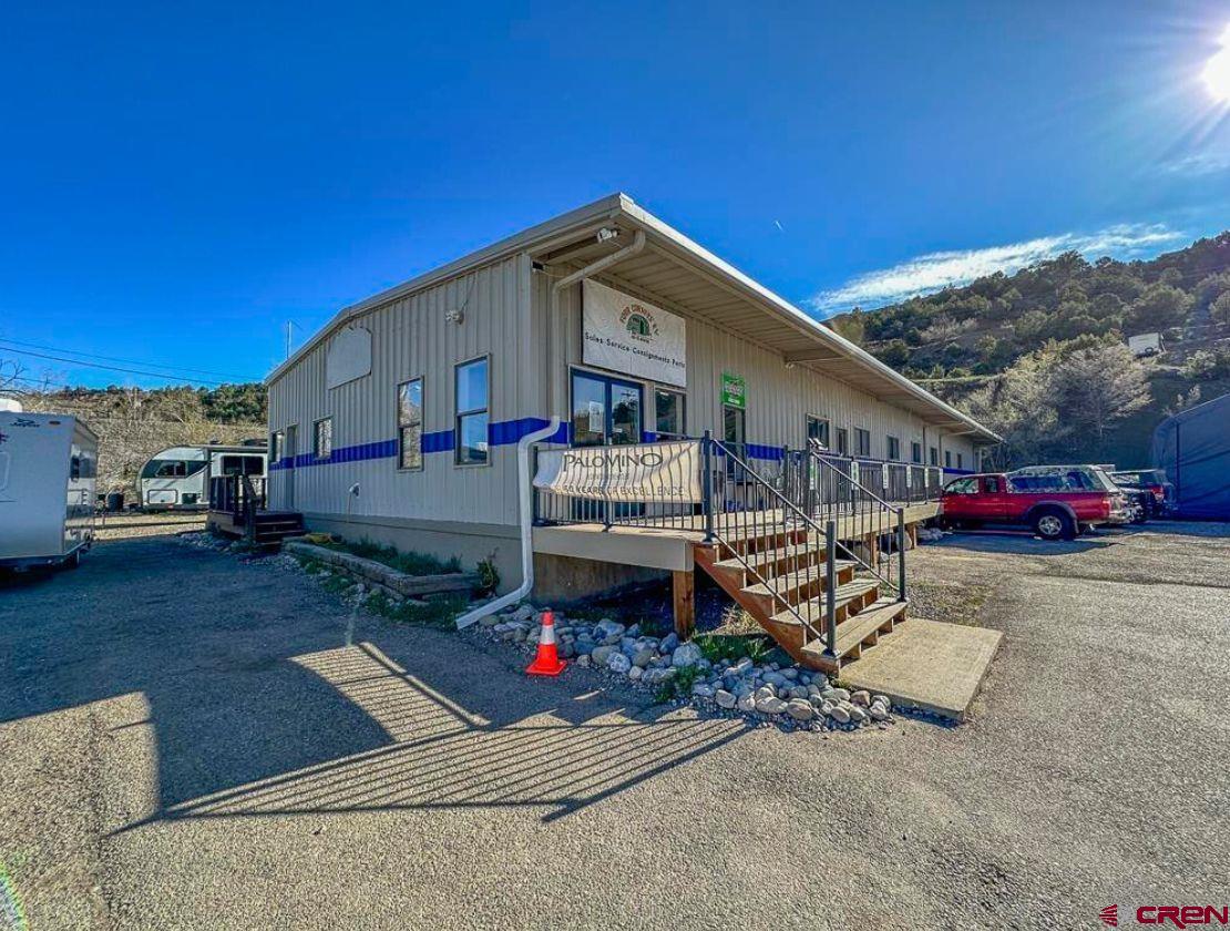1479 Highway 3 Durango, CO 81301 - Photo 2 of 19 a view of a car park in front of house