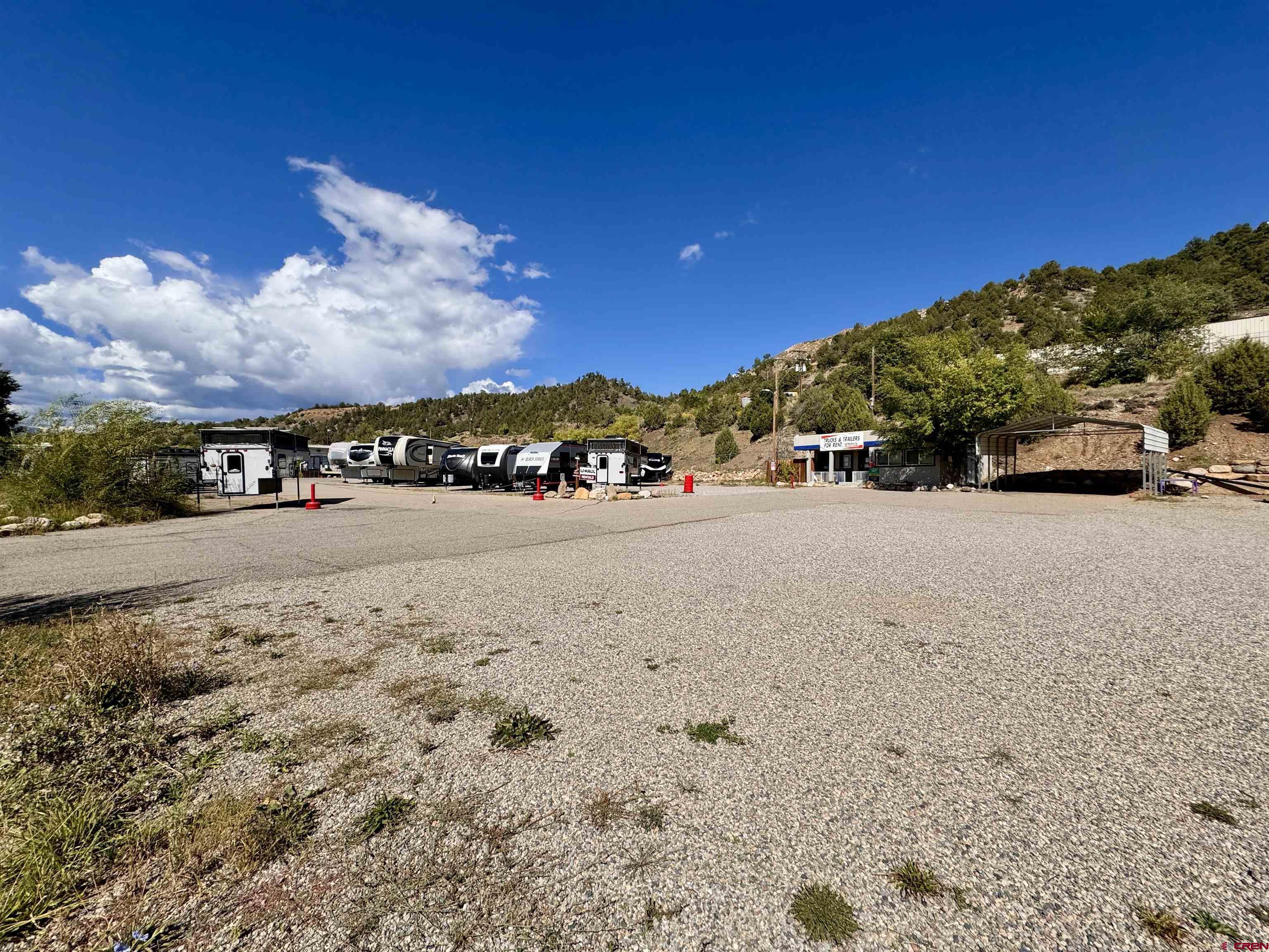 1479 Highway 3 Durango, CO 81301 - Photo 8 of 19 a view of dirt road with a building in the background