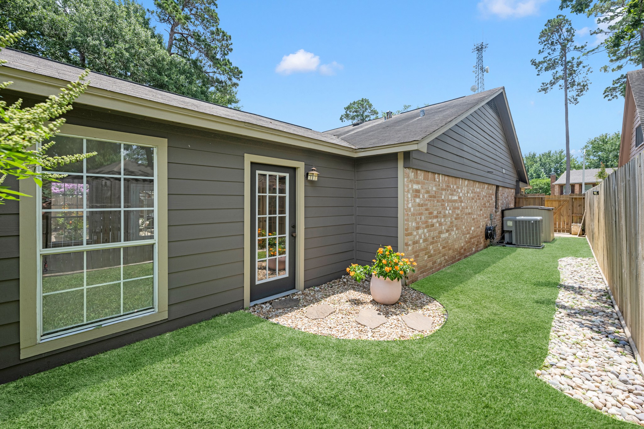 622 South Rivershire Drive Conroe, TX 77304 - Photo 7 of 25 Even the side yard is thoughtfully designed