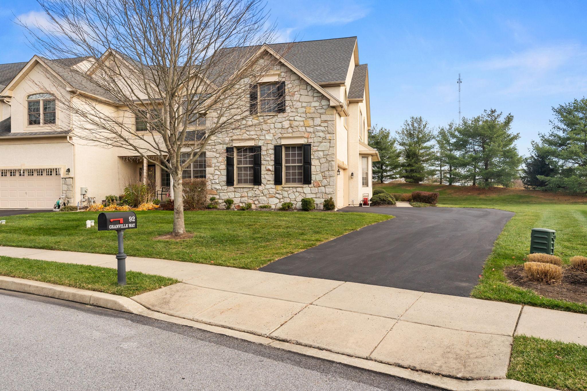 92 Granville Way Exton, PA 19341 - Photo 1 of 2 a front view of house with yard and green space