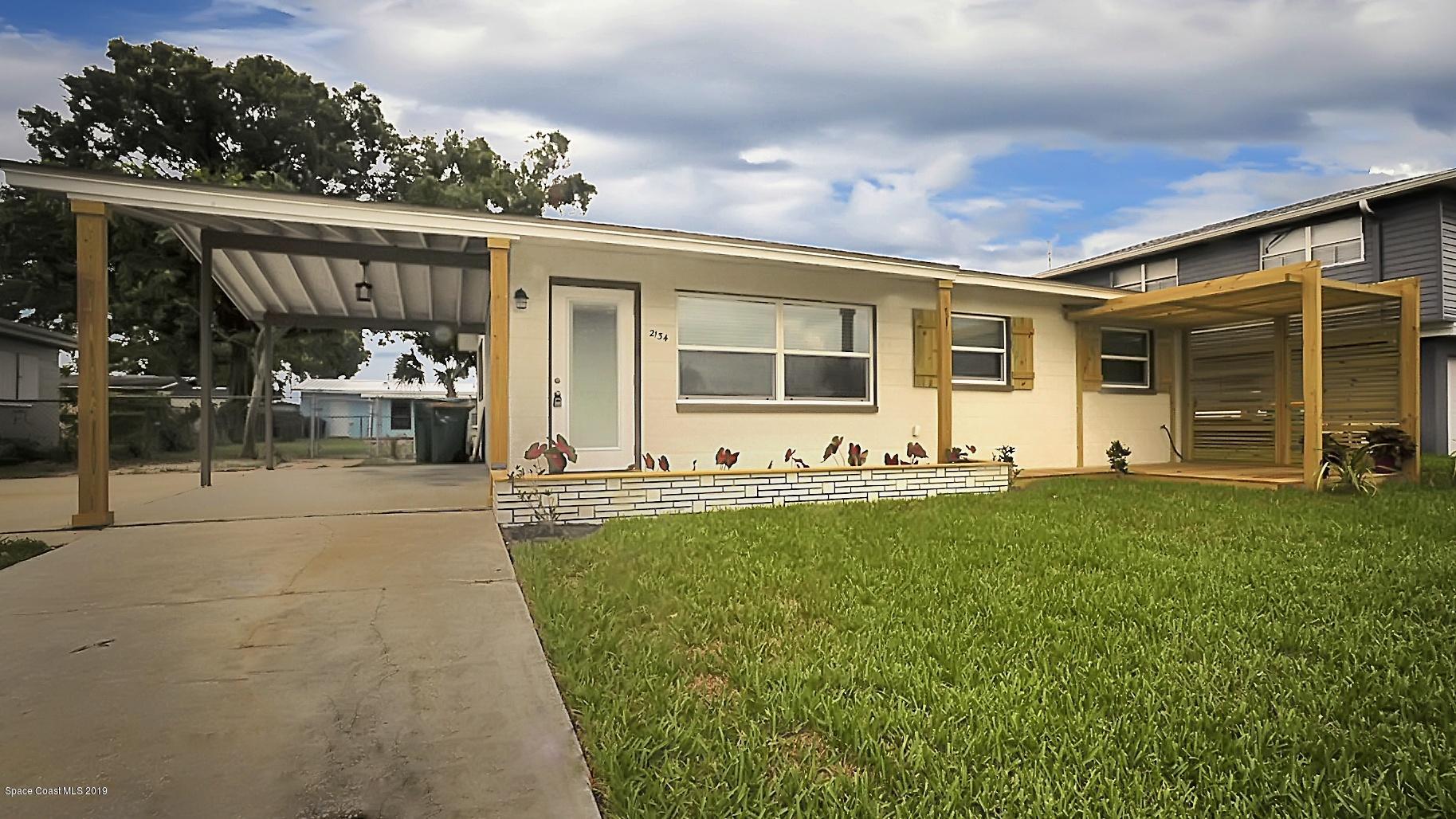 2134 Heath Road Melbourne, FL 32935 - Photo 1 of 19 REW_1611_edited