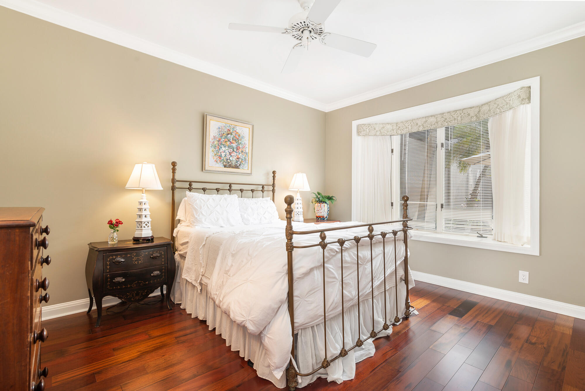 12079 Southeast Birkdale Run Jupiter, FL 33469 - Photo 22 of 50 a bedroom with a bed and a table