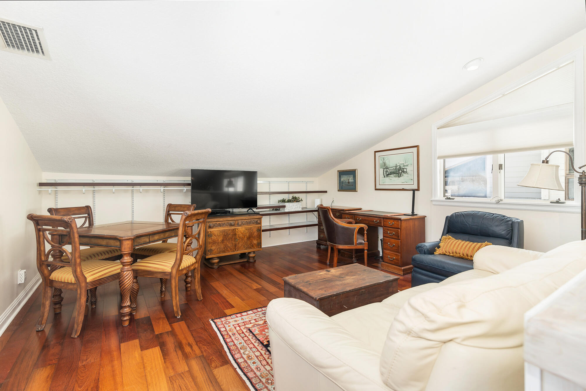 12079 Southeast Birkdale Run Jupiter, FL 33469 - Photo 25 of 50 a living room with furniture and a flat screen tv