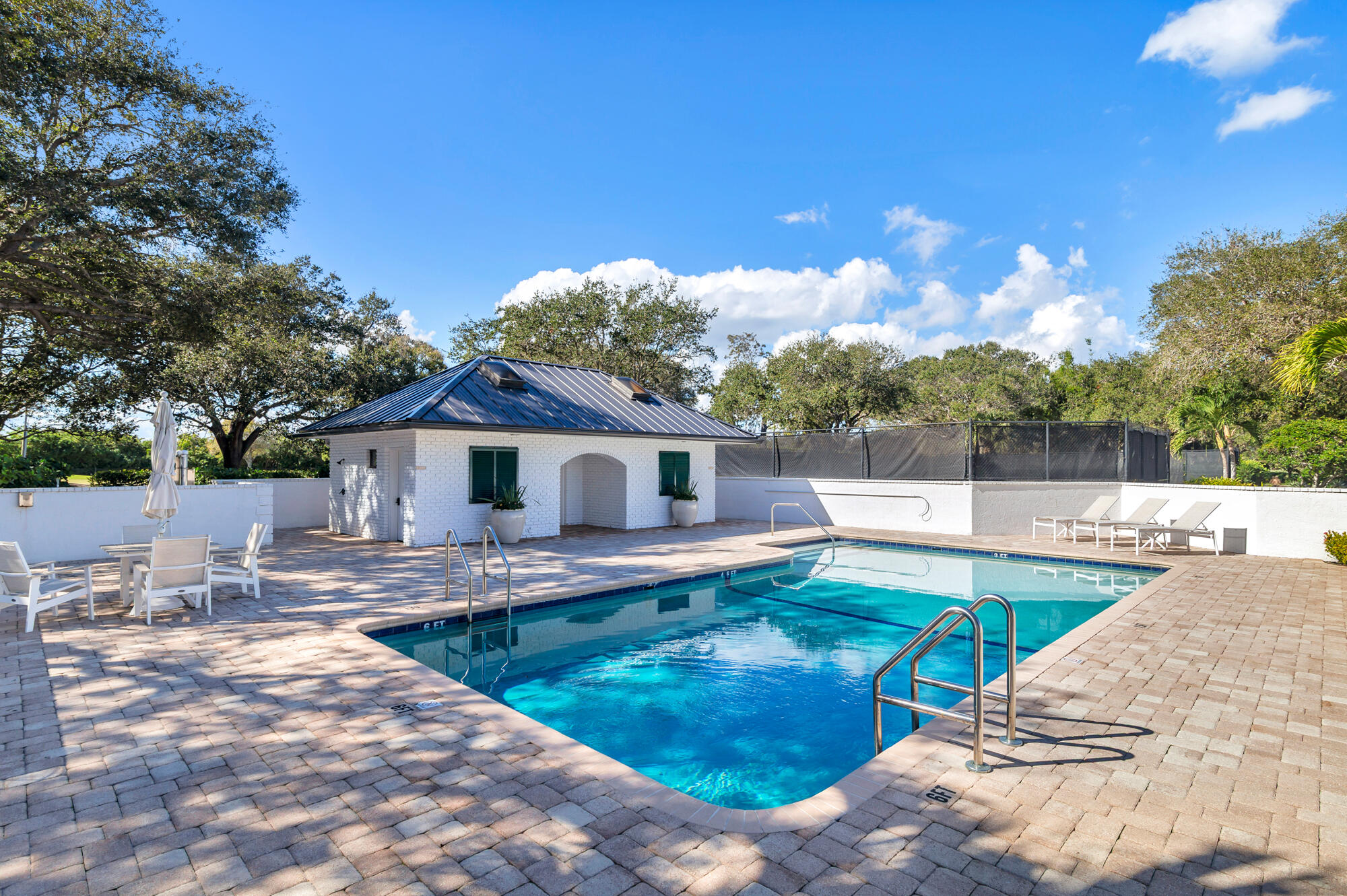 12079 Southeast Birkdale Run Jupiter, FL 33469 - Photo 41 of 50 a view of a house with pool and sitting area