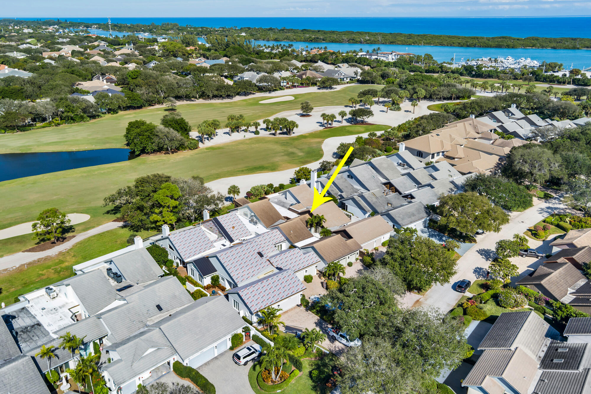12079 Southeast Birkdale Run Jupiter, FL 33469 - Photo 43 of 50 an aerial view of residential houses with outdoor space