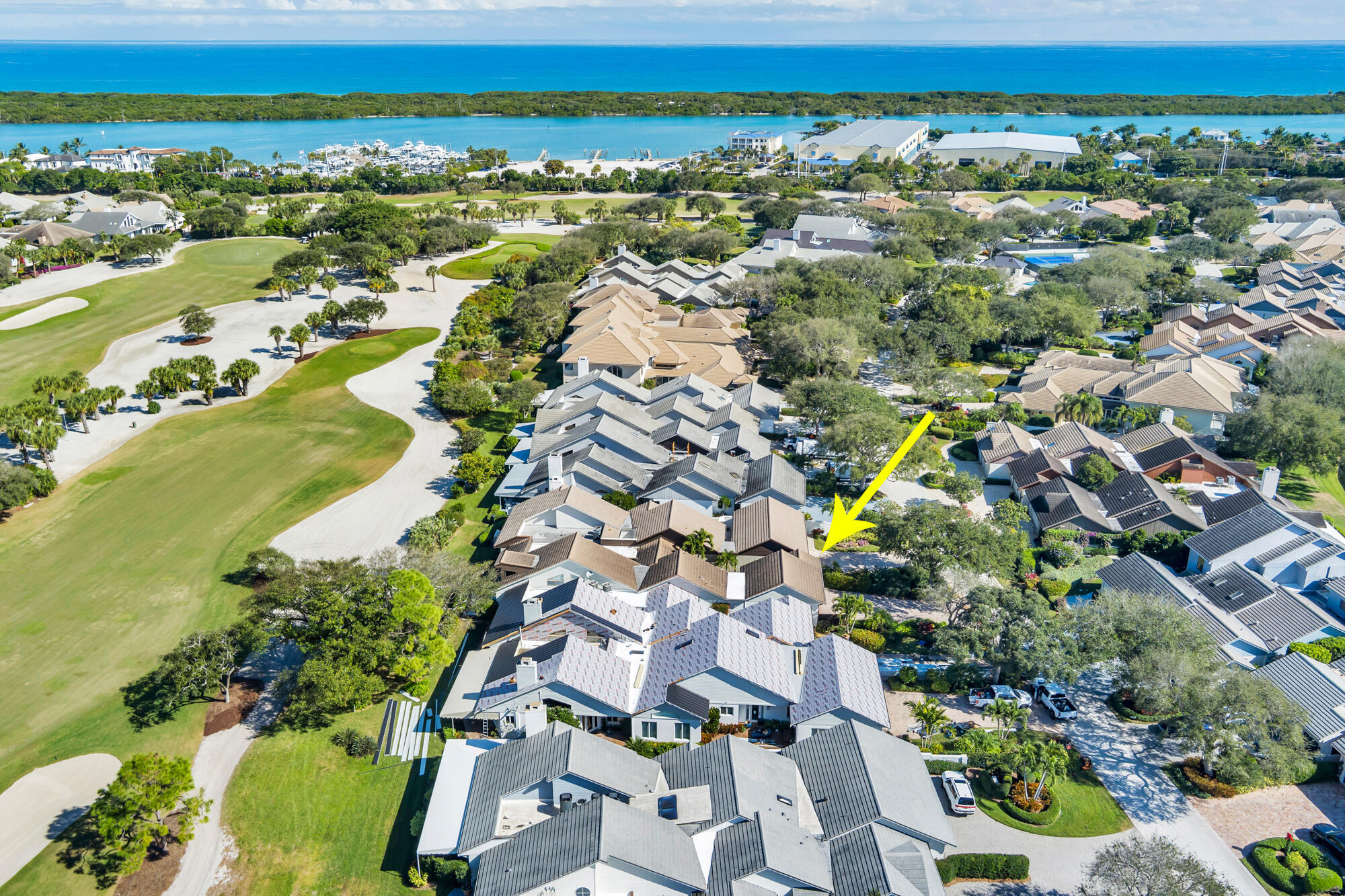 12079 Southeast Birkdale Run Jupiter, FL 33469 - Photo 45 of 50 an aerial view of residential houses with outdoor space
