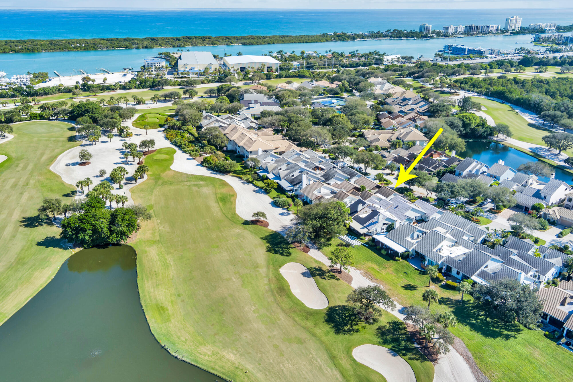 12079 Southeast Birkdale Run Jupiter, FL 33469 - Photo 48 of 50 an aerial view of residential houses with outdoor space