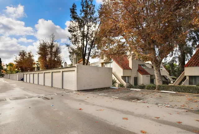 a view of wooden fence and a bench