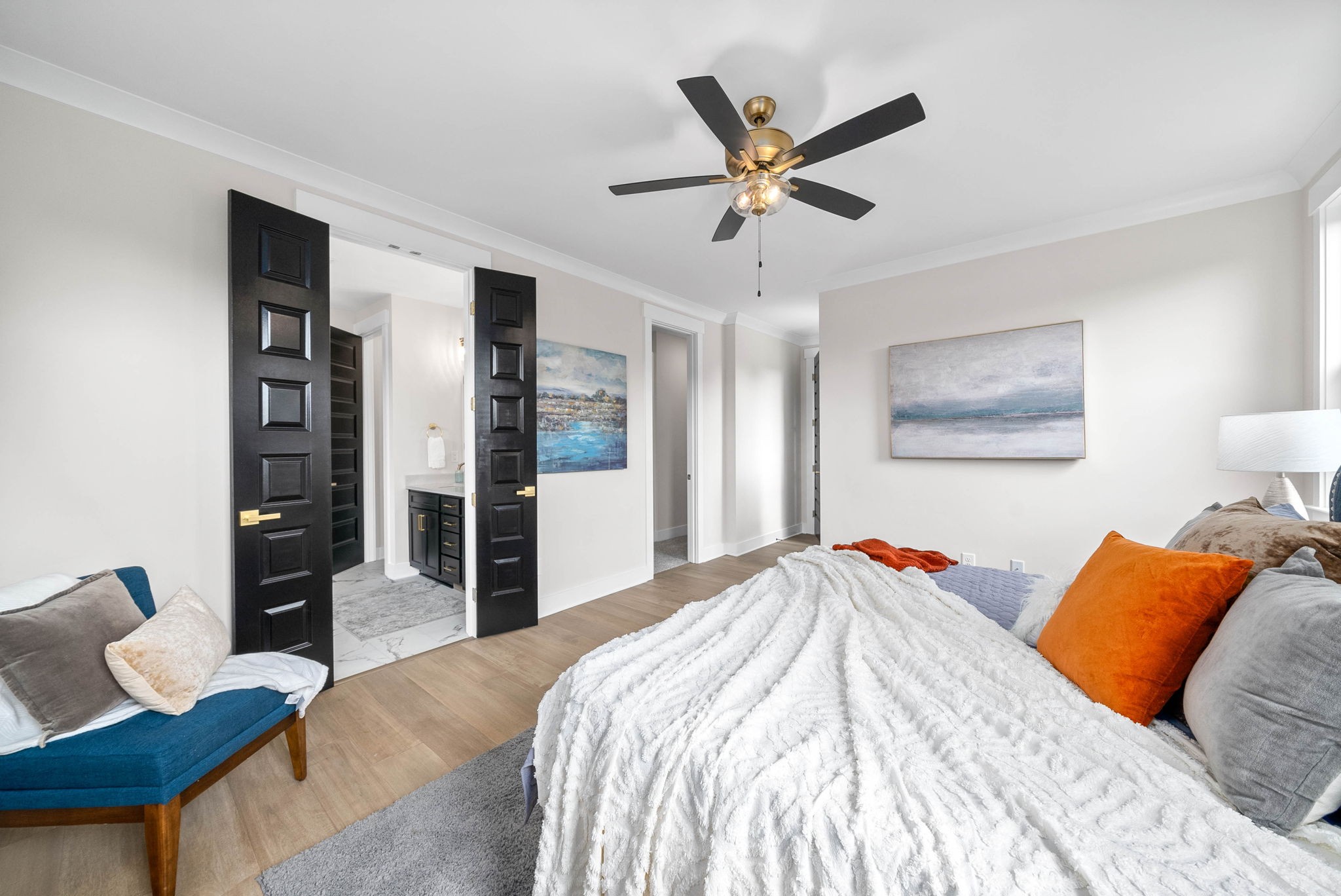 122 Augusta Trail Springfield, TN 37172 - Photo 19 of 51 a bedroom with a large bed and a chandelier